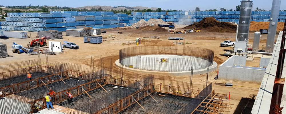 During construction, the foundation was also poured for the Phase 2 build out, which will include another four digesters (Phase 1 digesters during construction in foreground above). Photo courtesy of CR&R, Inc.